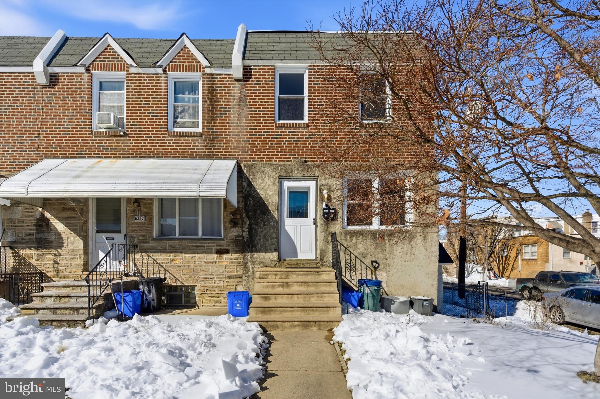 a view of a house with large windows