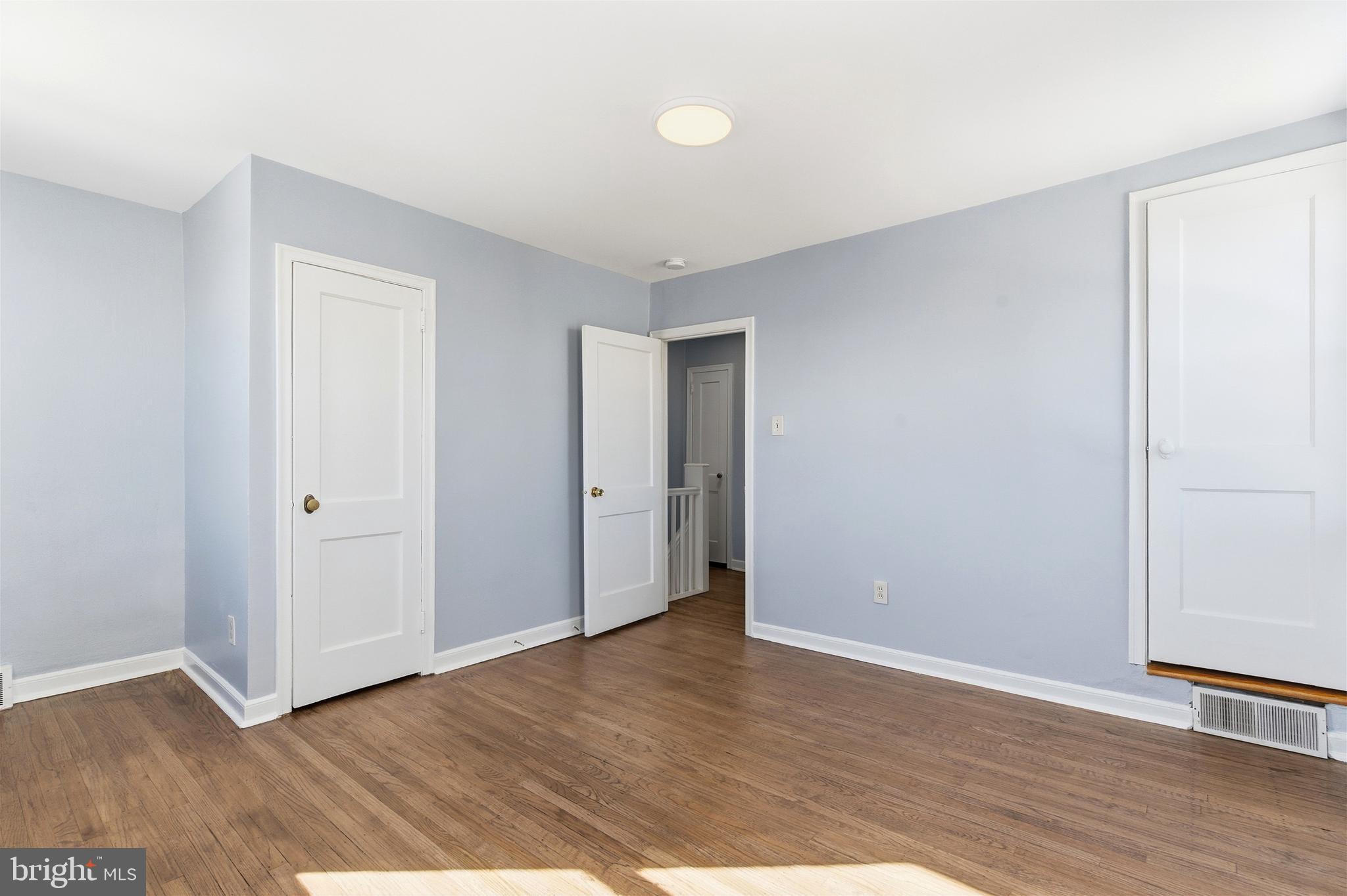 6266 Marsden Street Philadelphia, PA 19135 - Photo 15 of 27 a view of an empty room with wooden floor