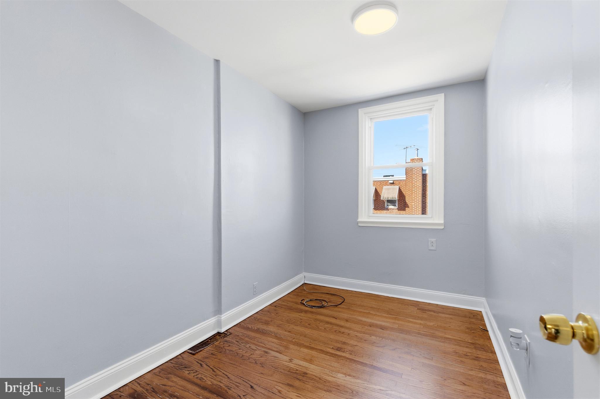 6266 Marsden Street Philadelphia, PA 19135 - Photo 16 of 27 a view of room with wooden floor and fan