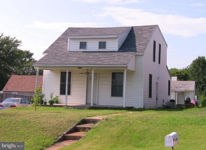 8110 Old Philadelphia Road Rosedale, MD 21237 - Photo 1 of 1 a front view of a house with garden