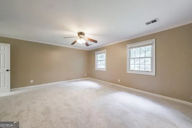 wooden floor and windows in a room