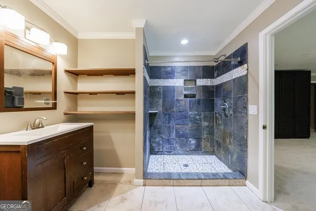 a large room with a large window and chandelier