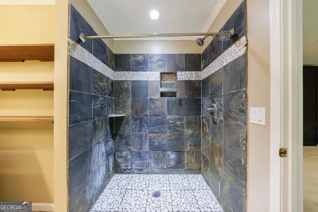 a view of balcony with wooden floor and outdoor seating