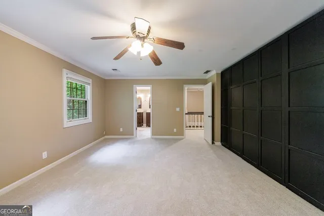 a view of a house with backyard sitting area and garden