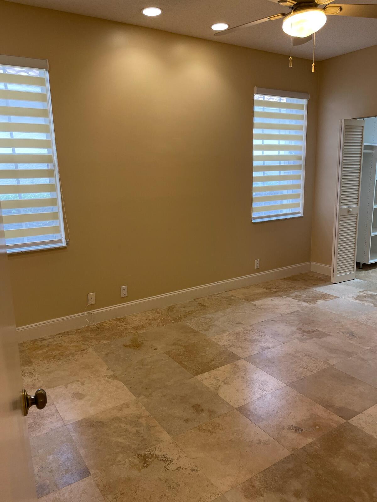 6675 Northwest 25th Way Boca Raton, FL 33496 - Photo 18 of 54 a view of an empty room with a window