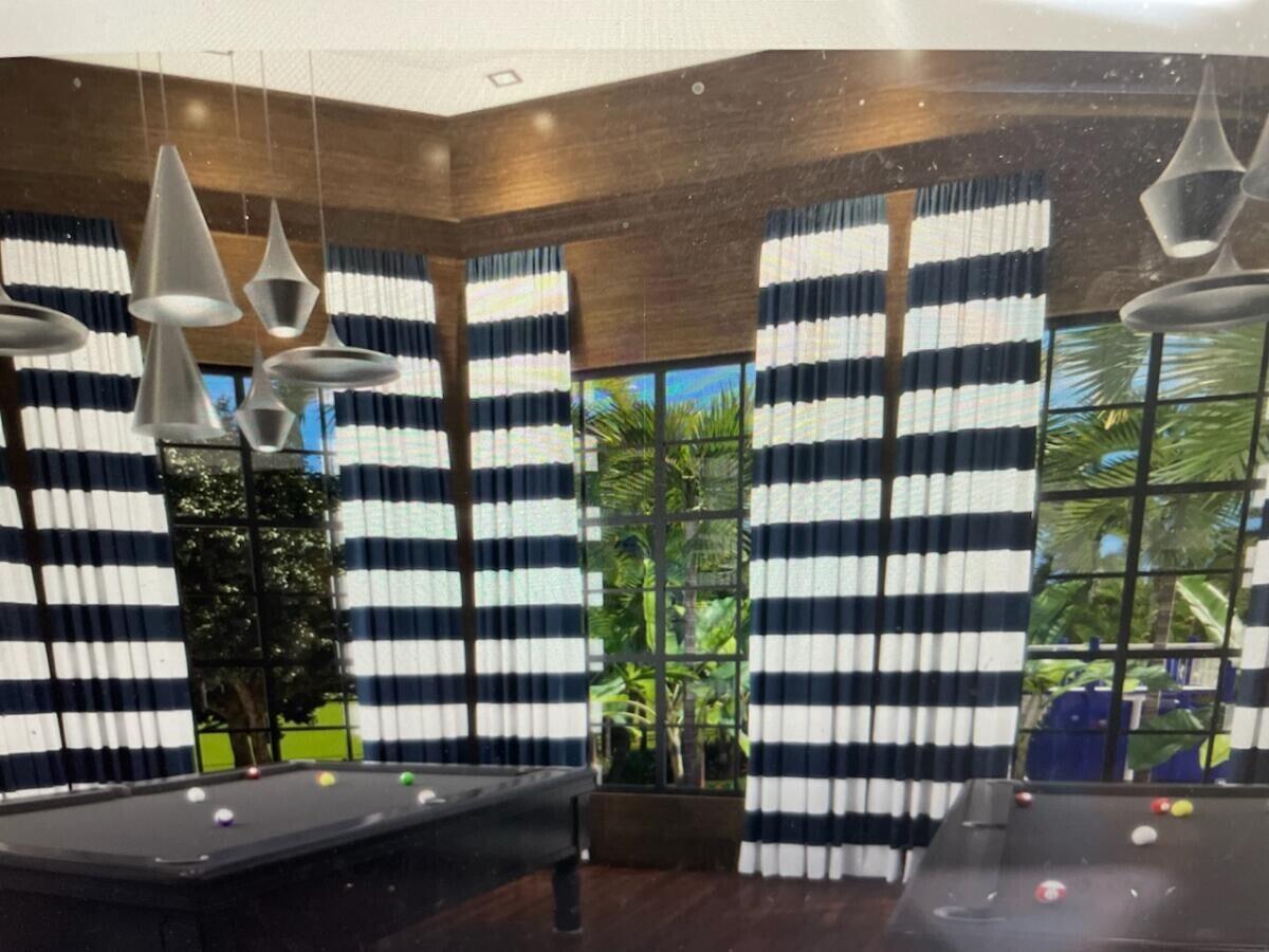 6675 Northwest 25th Way Boca Raton, FL 33496 - Photo 40 of 54 a view of entryway with a street