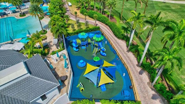 an aerial view of house with swimming pool