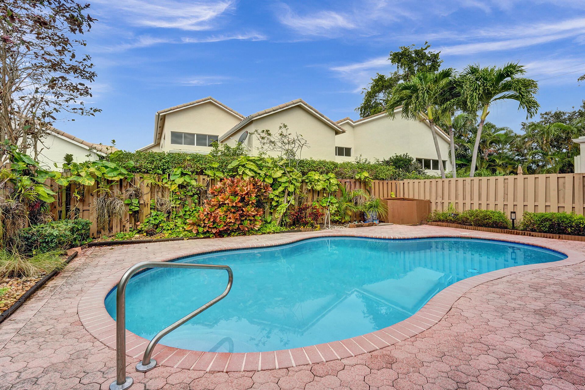 6675 Northwest 25th Way Boca Raton, FL 33496 - Photo 6 of 54 a view of swimming pool having outdoor seating