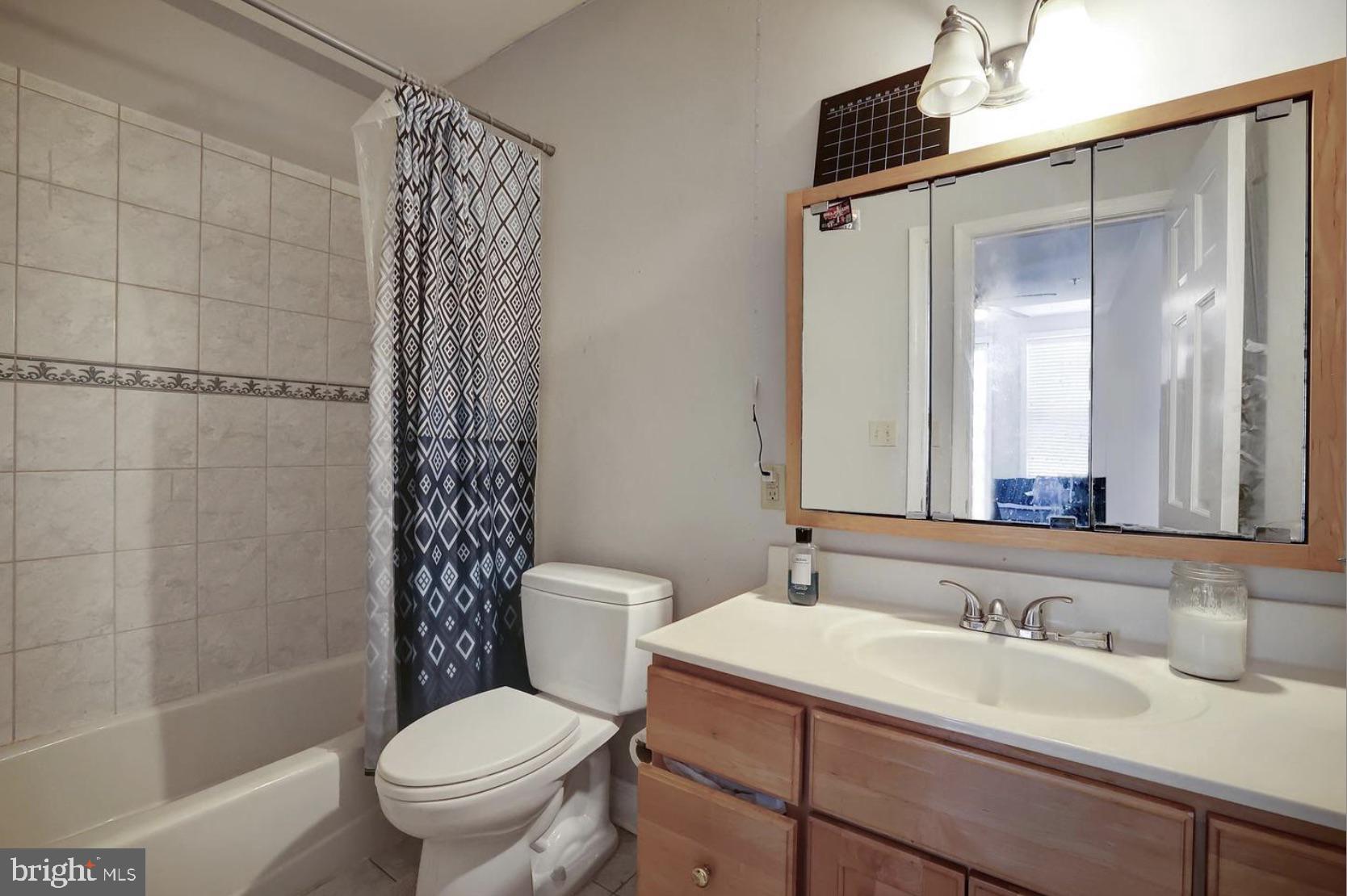 1316 Irving Street Northwest Washington, DC 20010 - Photo 19 of 29 a bathroom with a sink toilet and shower