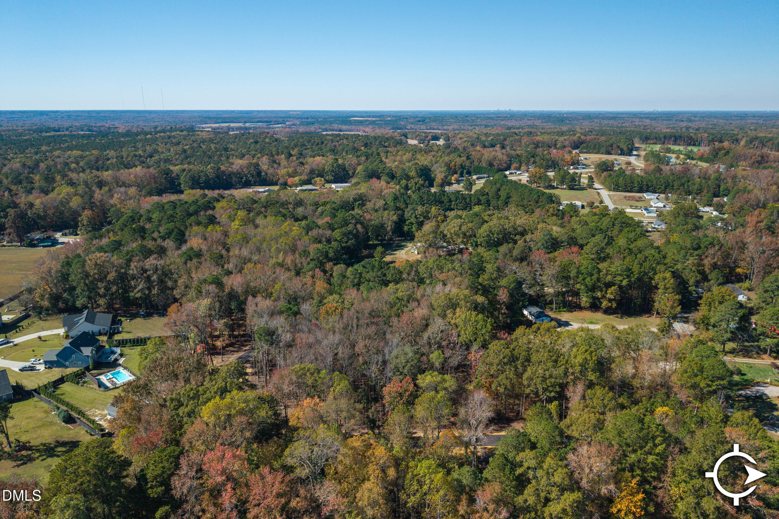 1200 Lake Wendell Road Wendell, NC 27591 - Photo 14 of 14 a view of a city with lush green forest