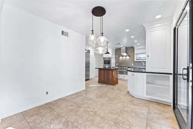 a view of a yard and tree on the roof