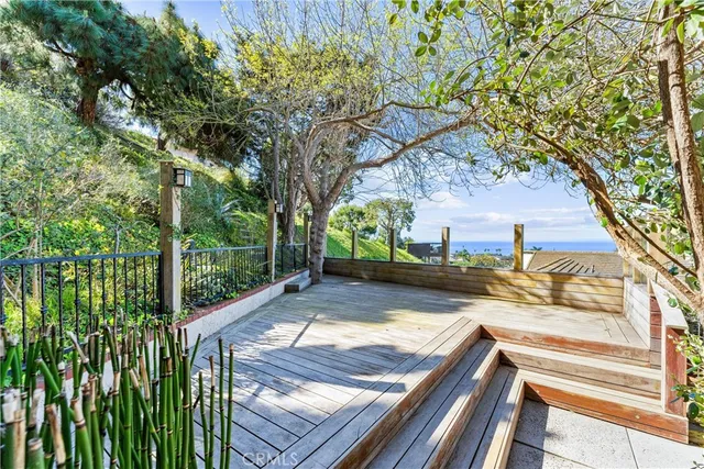 a view of a hall with kitchen