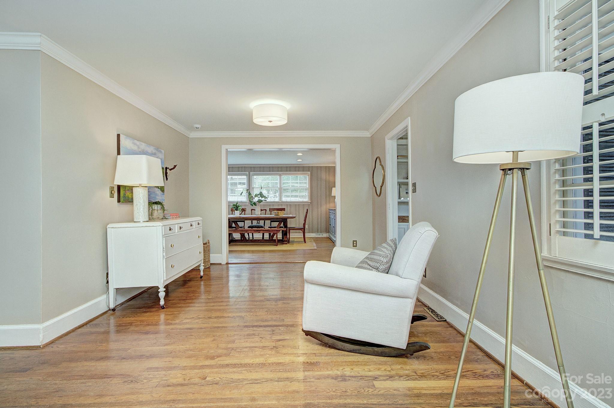 1000 Sedgefield Road Charlotte, NC 28209 - Photo 7 of 29 a living room with furniture and a wooden floor