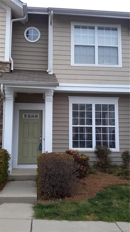 311 Sugar Ridge Court, Unit 109 Fort Mill, SC 29708 - Photo 2 of 23 a front view of a house with a yard
