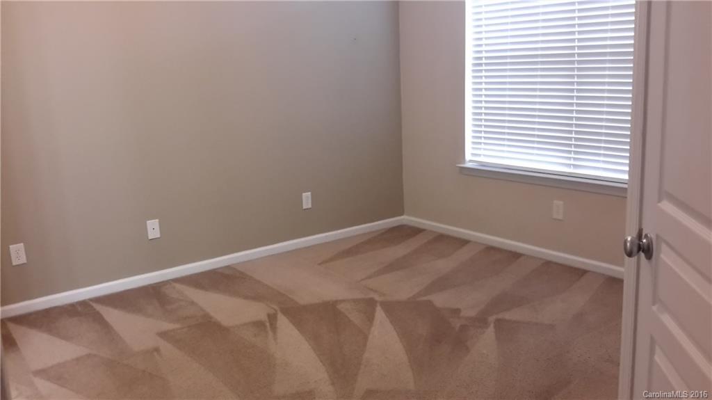311 Sugar Ridge Court, Unit 109 Fort Mill, SC 29708 - Photo 12 of 23 a view of a room with a window