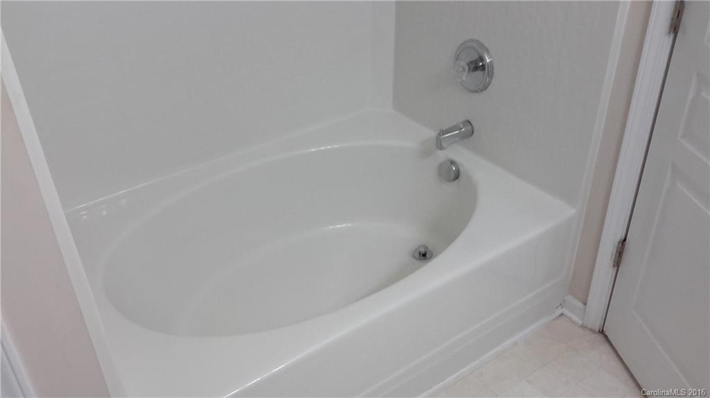 311 Sugar Ridge Court, Unit 109 Fort Mill, SC 29708 - Photo 16 of 23 a close view of a bathtub in bathroom