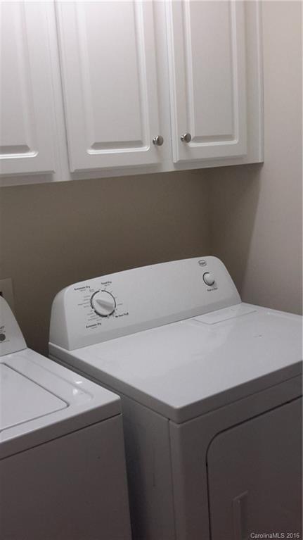 311 Sugar Ridge Court, Unit 109 Fort Mill, SC 29708 - Photo 17 of 23 a utility room with dryer and washer