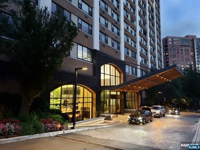 a view of a building with a swimming pool