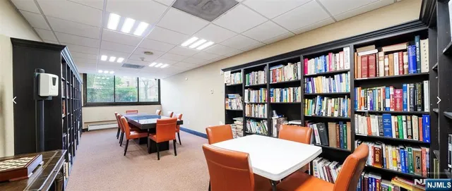 a view of a living room and a balcony