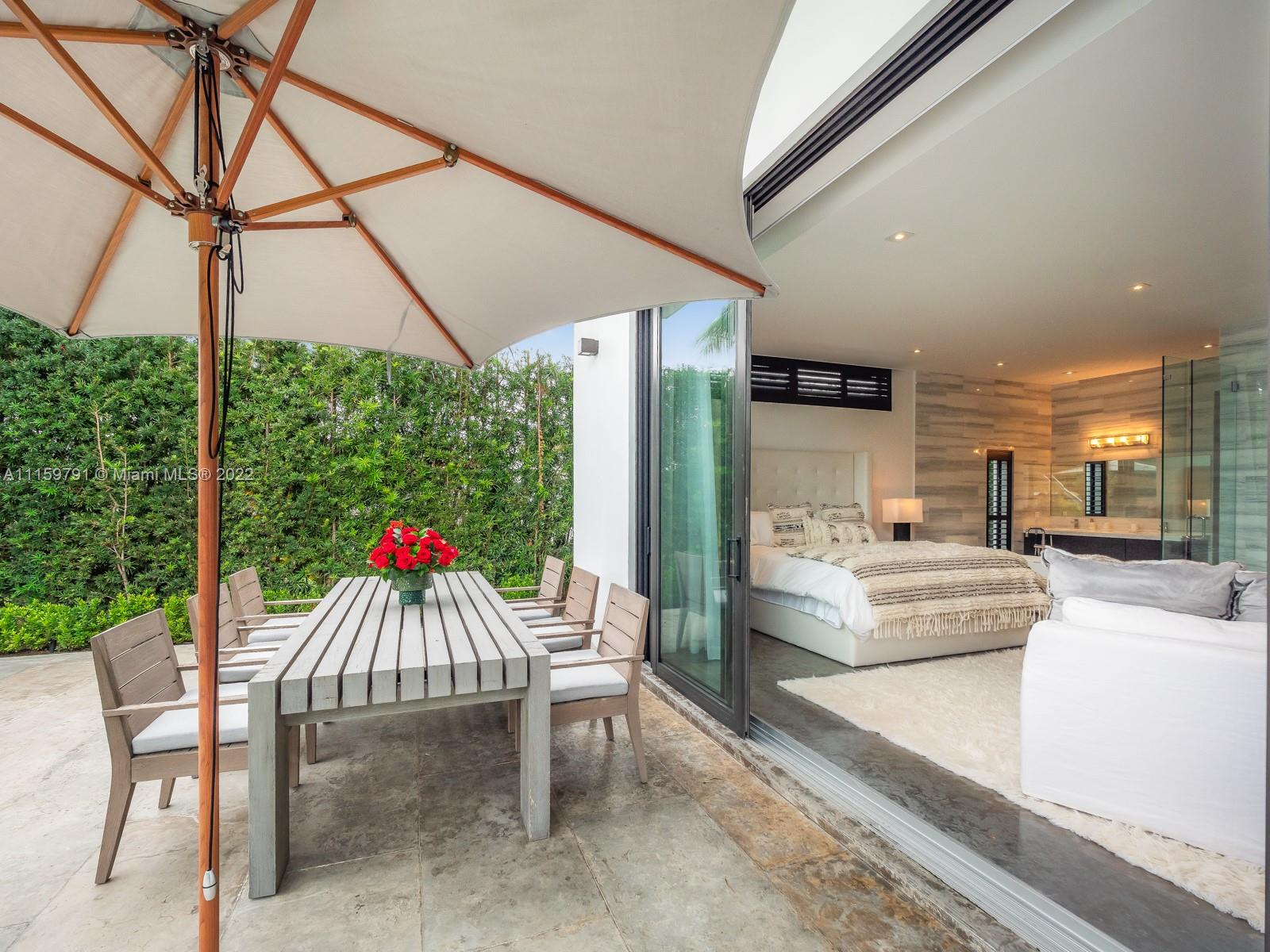 1540 Cleveland Road Miami Beach, FL 33141 - Photo 3 of 28 a view of a dining room with furniture window and outside view