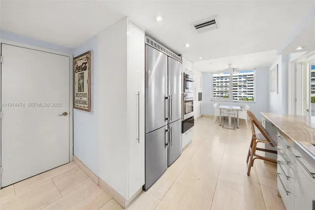 a bedroom with a bed and a book shelf