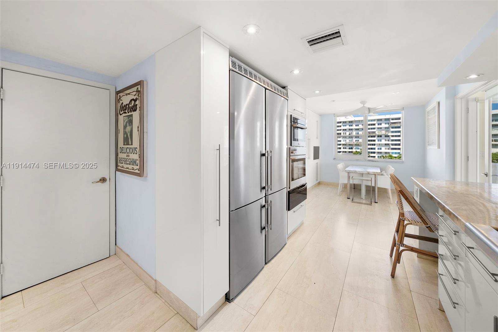 200 Ocean Ln Drive, Unit 501 Key Biscayne, FL 33149 - Photo 25 of 71 a bathroom with a bathtub and a shower