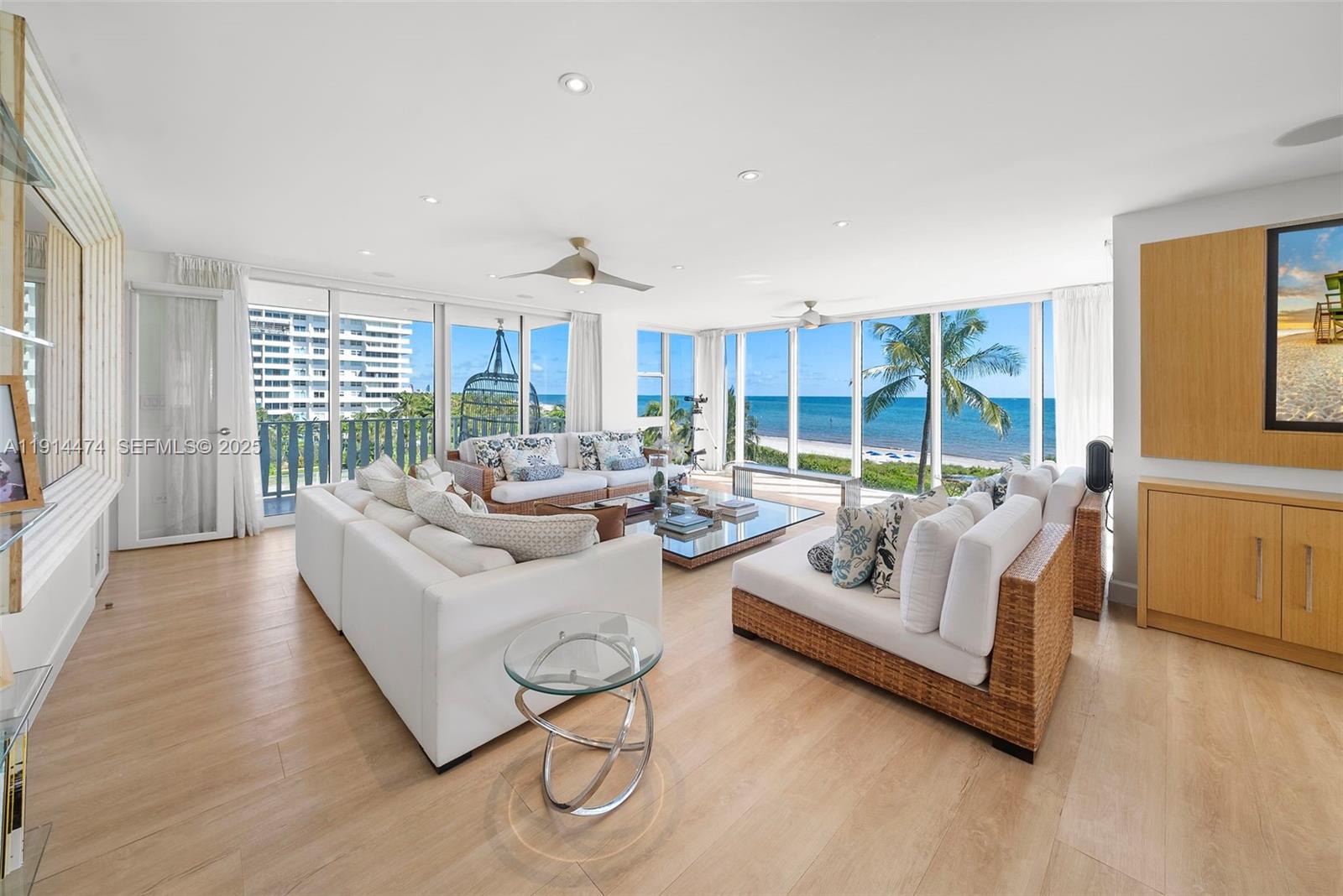 200 Ocean Ln Drive, Unit 501 Key Biscayne, FL 33149 - Photo 4 of 71 a living room with furniture and a large window