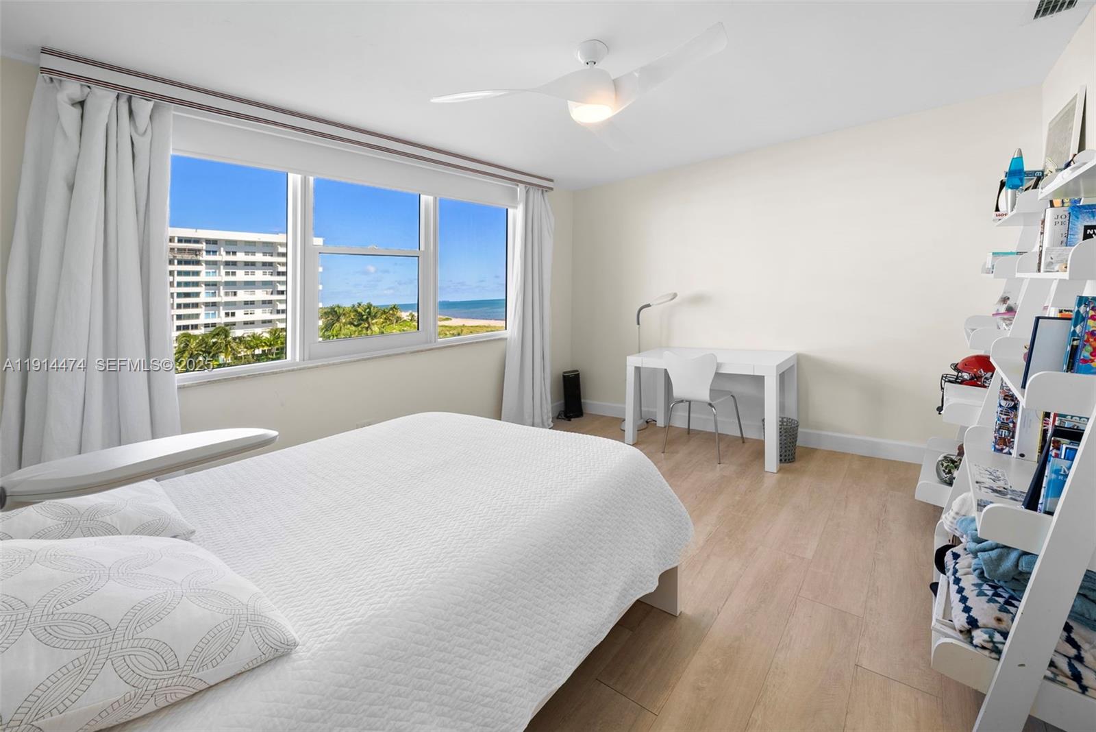 200 Ocean Ln Drive, Unit 501 Key Biscayne, FL 33149 - Photo 46 of 71 a bedroom with furniture and a window