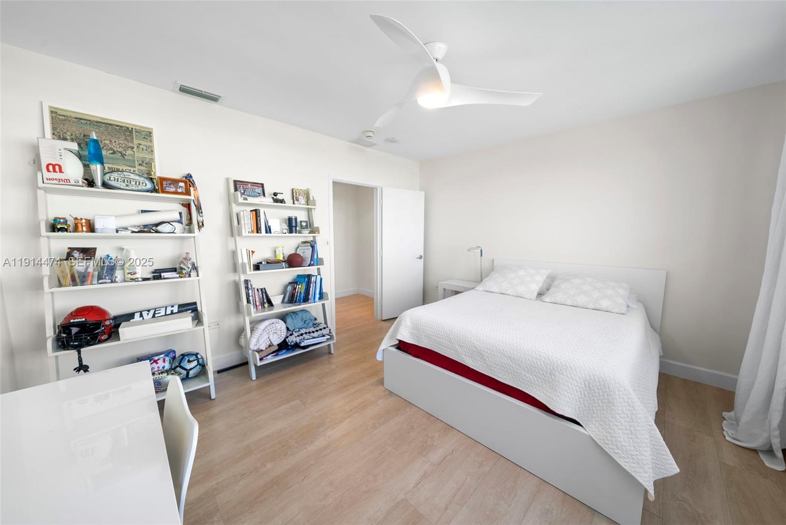 200 Ocean Ln Drive, Unit 501 Key Biscayne, FL 33149 - Photo 47 of 71 a bedroom with a bed and a window