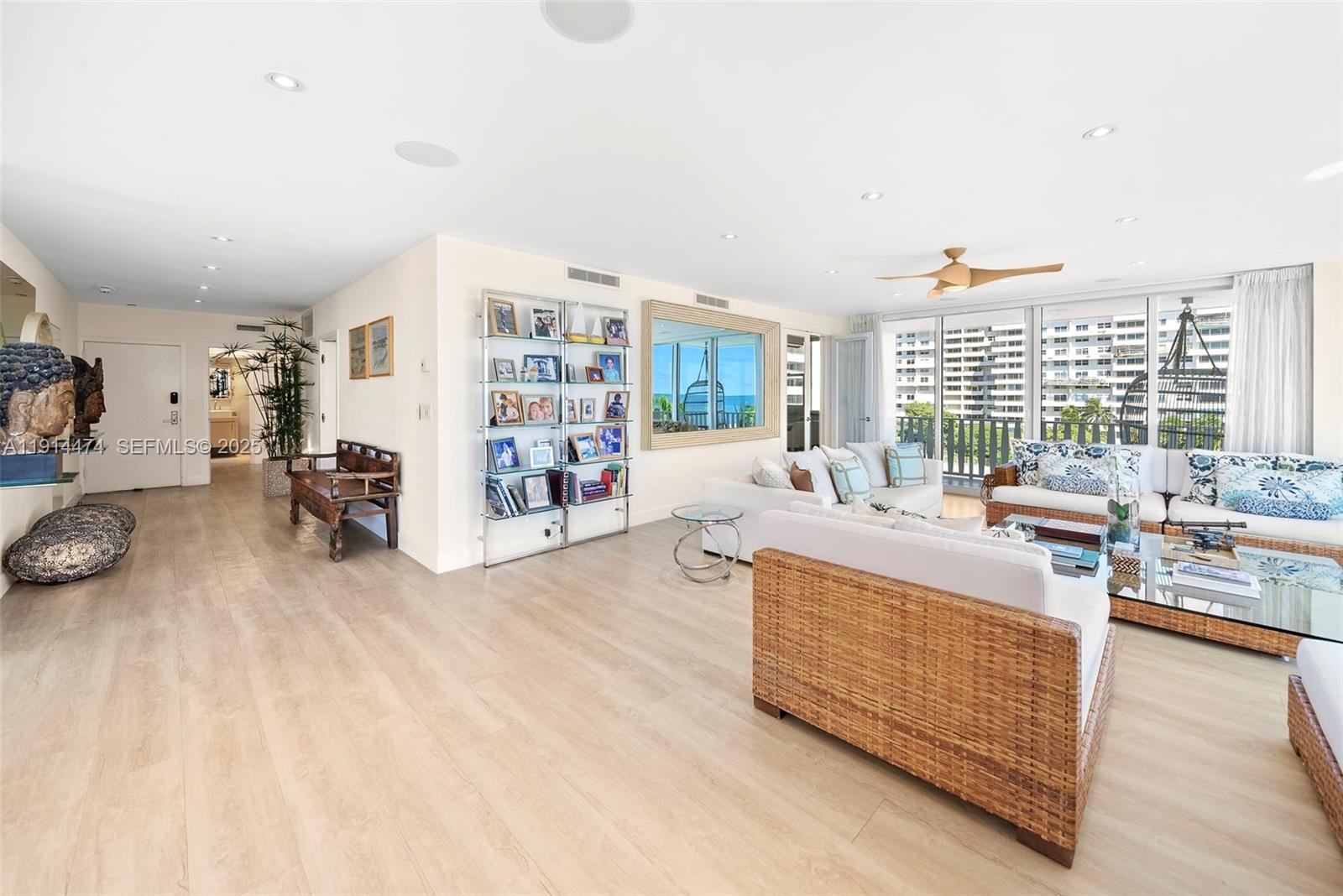 200 Ocean Ln Drive, Unit 501 Key Biscayne, FL 33149 - Photo 5 of 71 a living room with furniture and a large window
