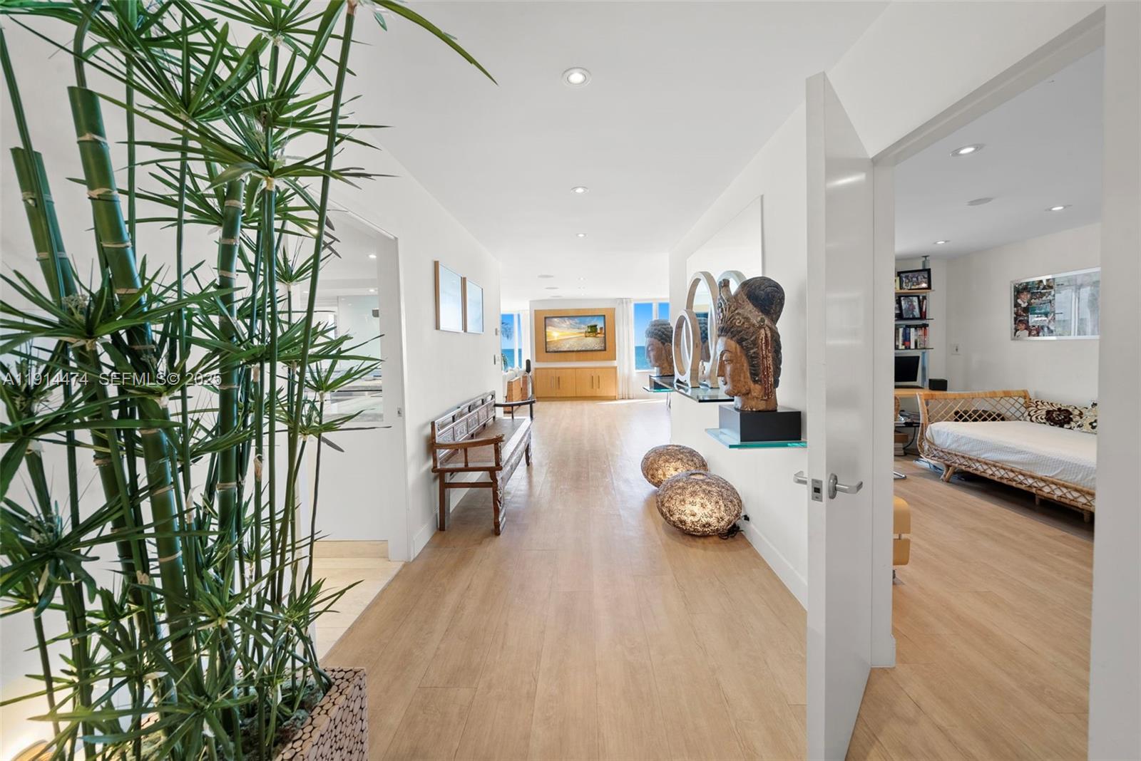 200 Ocean Ln Drive, Unit 501 Key Biscayne, FL 33149 - Photo 6 of 71 a bedroom with furniture and a potted plant