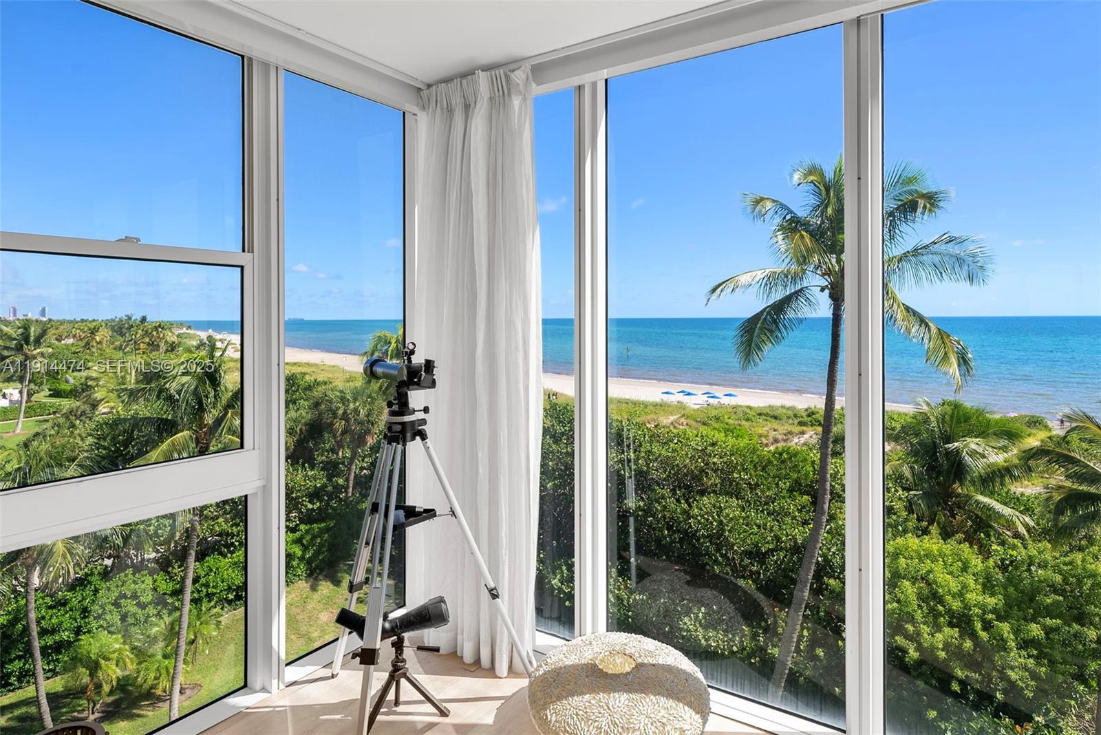 200 Ocean Ln Drive, Unit 501 Key Biscayne, FL 33149 - Photo 10 of 71 a view of a balcony with plants and a potted plant