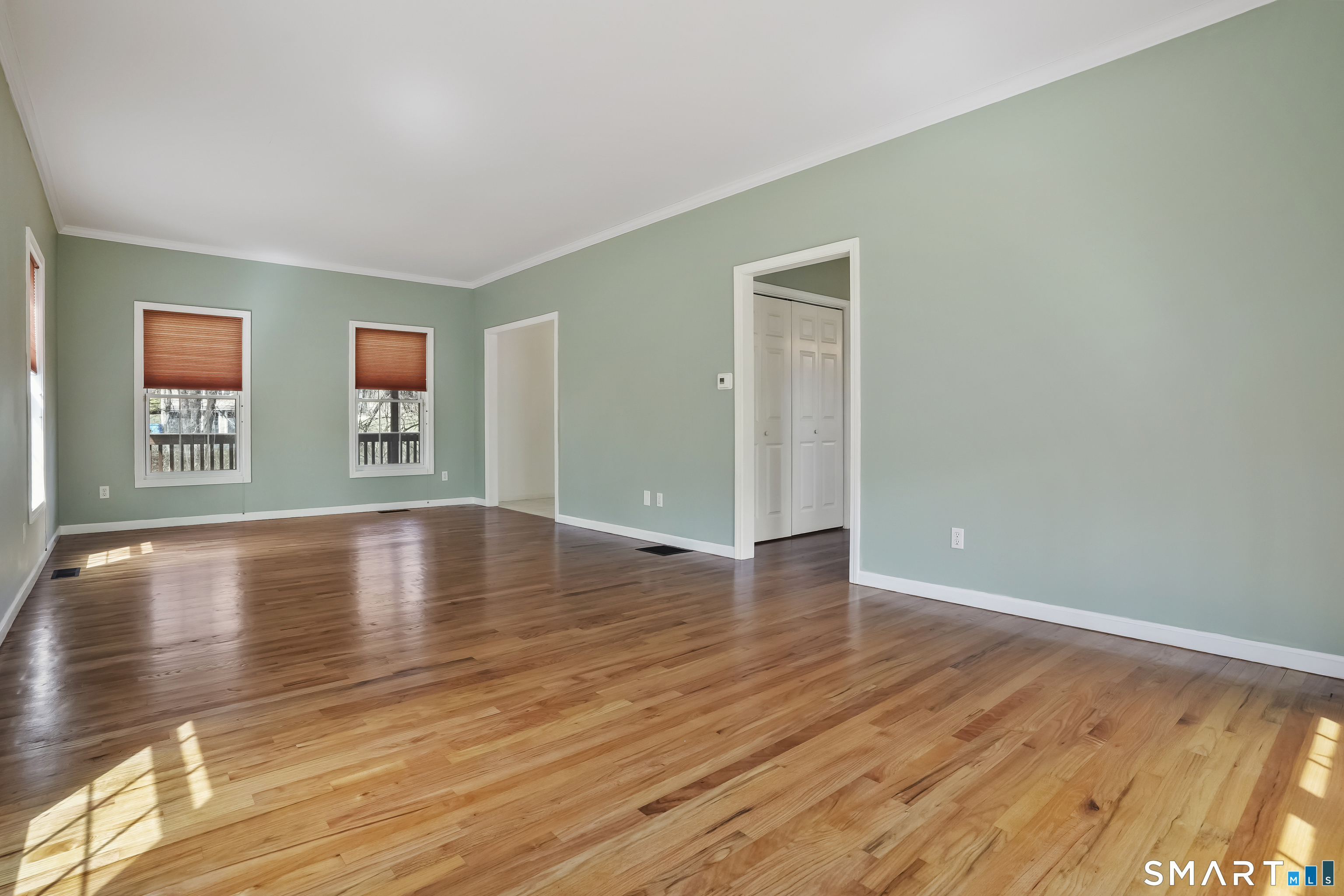72 Perry Hill Road Shelton, CT 06484 - Photo 14 of 36 a view of room with window and wooden floor