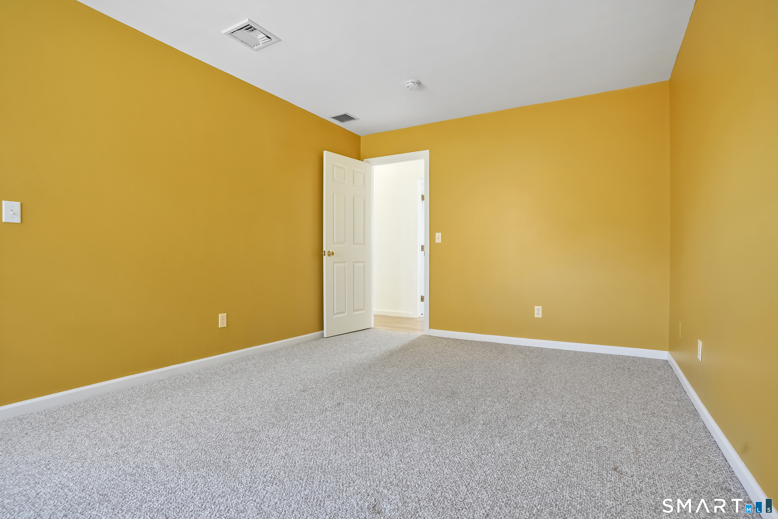 72 Perry Hill Road Shelton, CT 06484 - Photo 28 of 36 a view of an empty room with a window