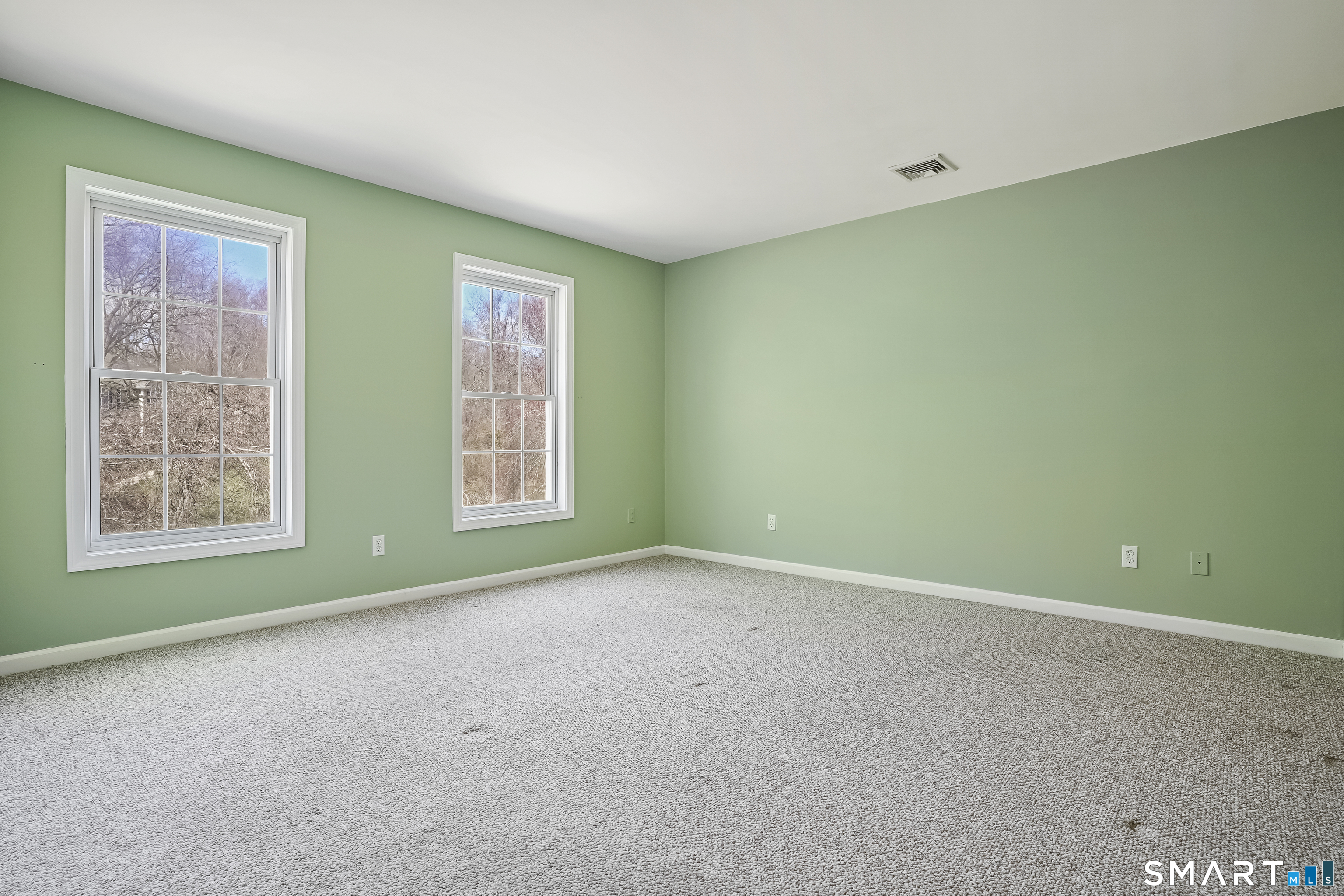72 Perry Hill Road Shelton, CT 06484 - Photo 32 of 36 an empty room with windows