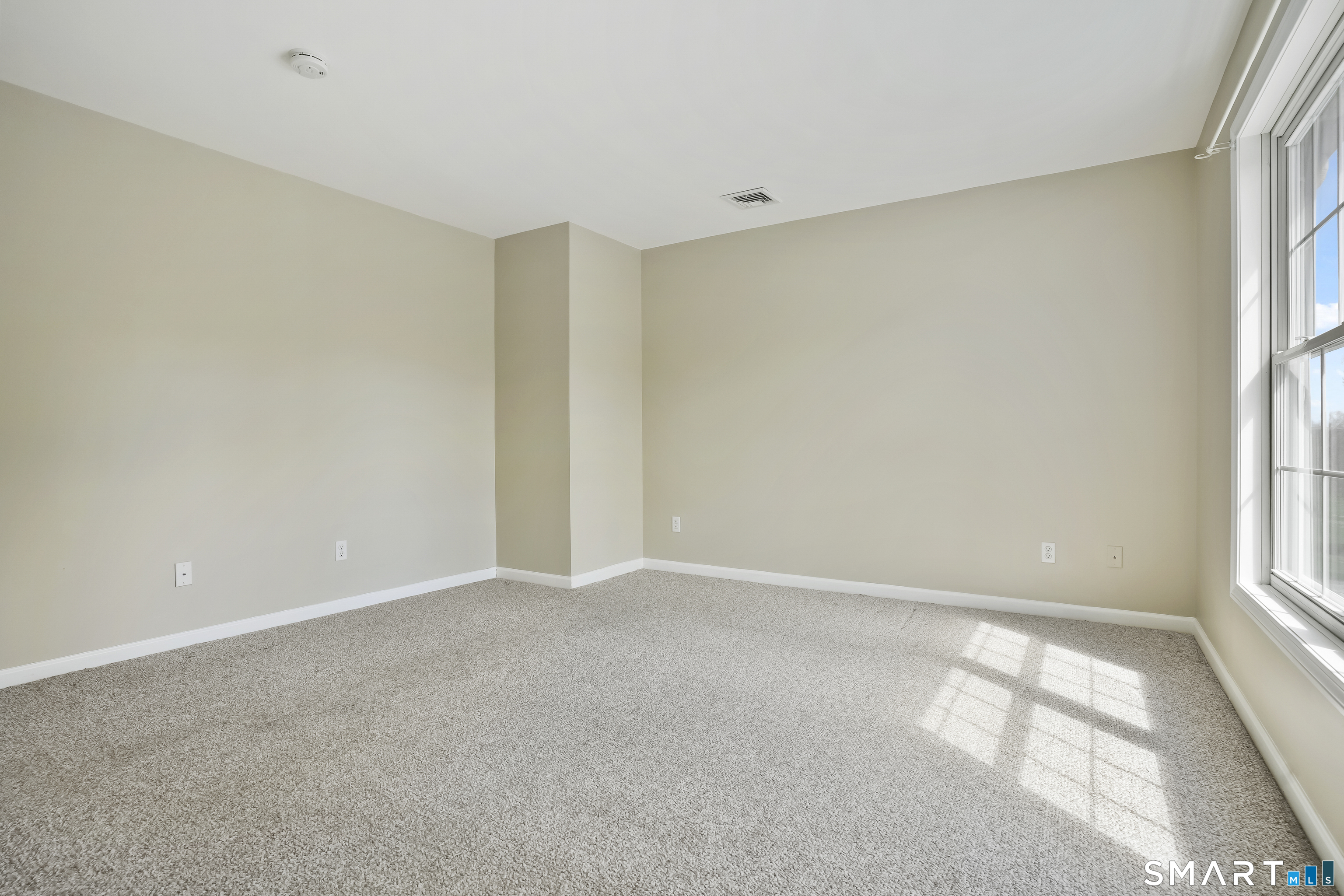 72 Perry Hill Road Shelton, CT 06484 - Photo 33 of 36 a view of an empty room with a window