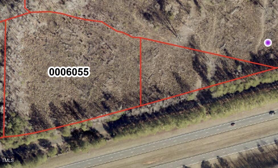 Tbd Tbd Alston Horton Service Road Pittsboro, NC 27312 - Photo 3 of 7 a street sign on a street next to a road