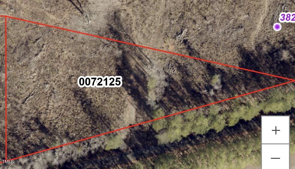 Tbd Tbd Alston Horton Service Road Pittsboro, NC 27312 - Photo 4 of 7 a view of a street with a building in the background