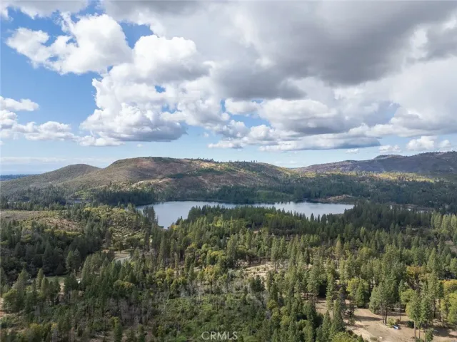 a view of lake with green space