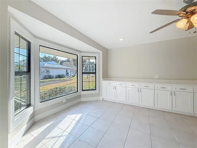 a kitchen with a stove and a microwave