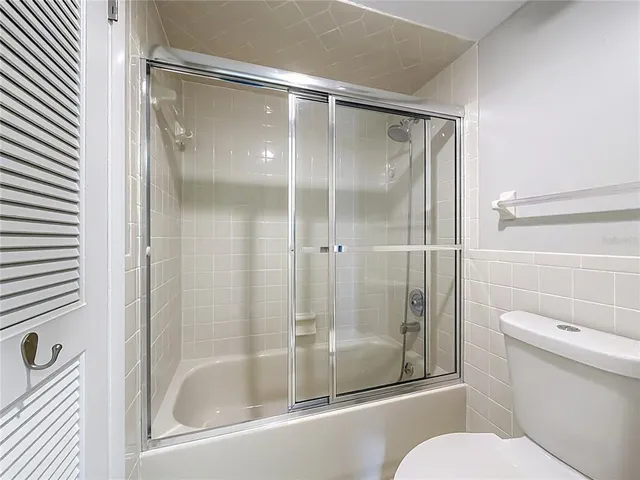 an aerial view of a city with big lake view