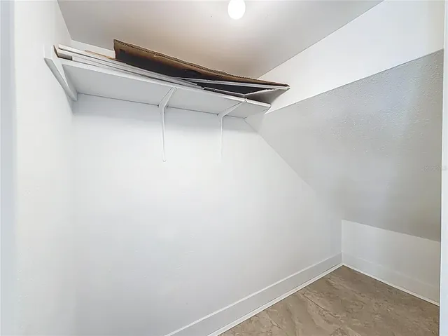 a view of a lake with a building in front of it