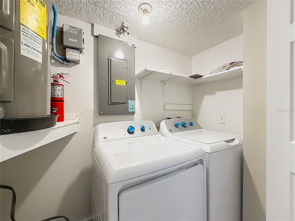 11603 West Bayshore Drive, Unit 118 Crystal River, FL 34429 - Photo 44 of 73 a utility room with dryer and washer