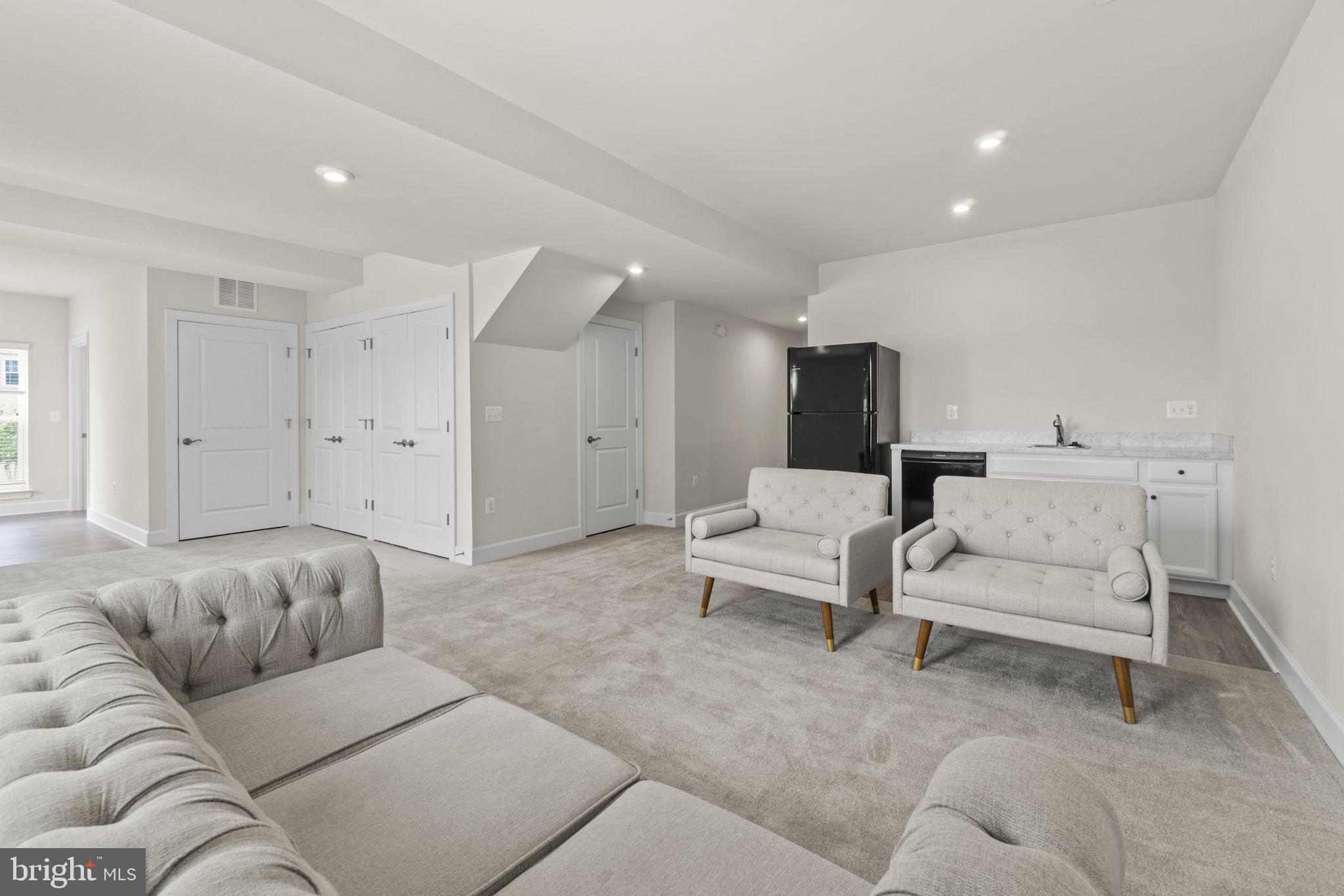 19203 Stoney Ridge Place Triangle, VA 22172 - Photo 20 of 26 Bsmt family room with wet bar area.