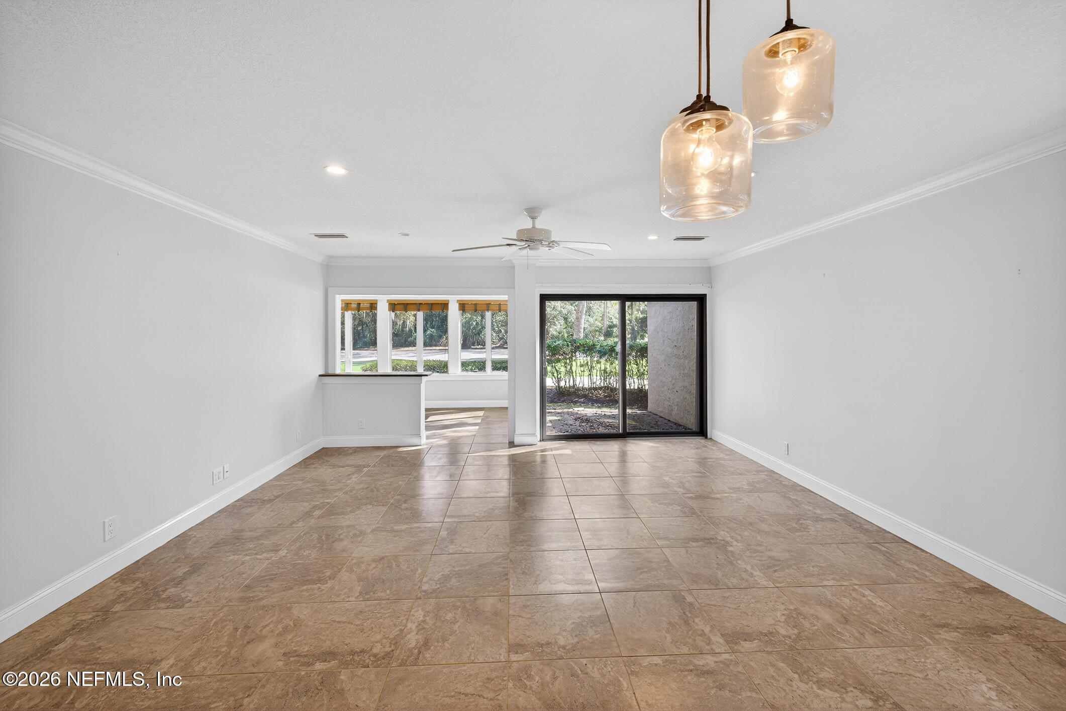 3301 Sea Marsh Road Fernandina Beach, FL 32034 - Photo 6 of 41 a view of an empty room with a window