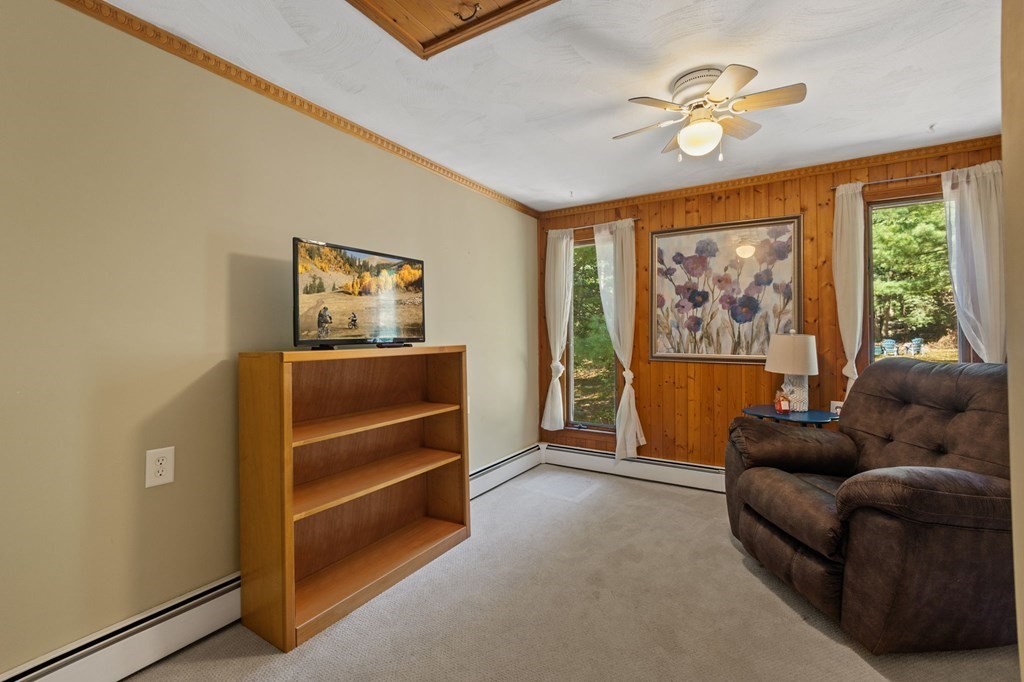 70 Colvintown Road Coventry, RI 02816 - Photo 23 of 41 a living room with furniture and a window