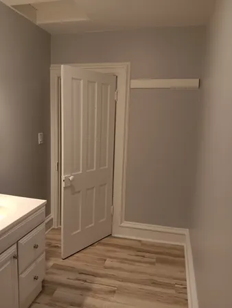 a bathroom with a sink and mirror