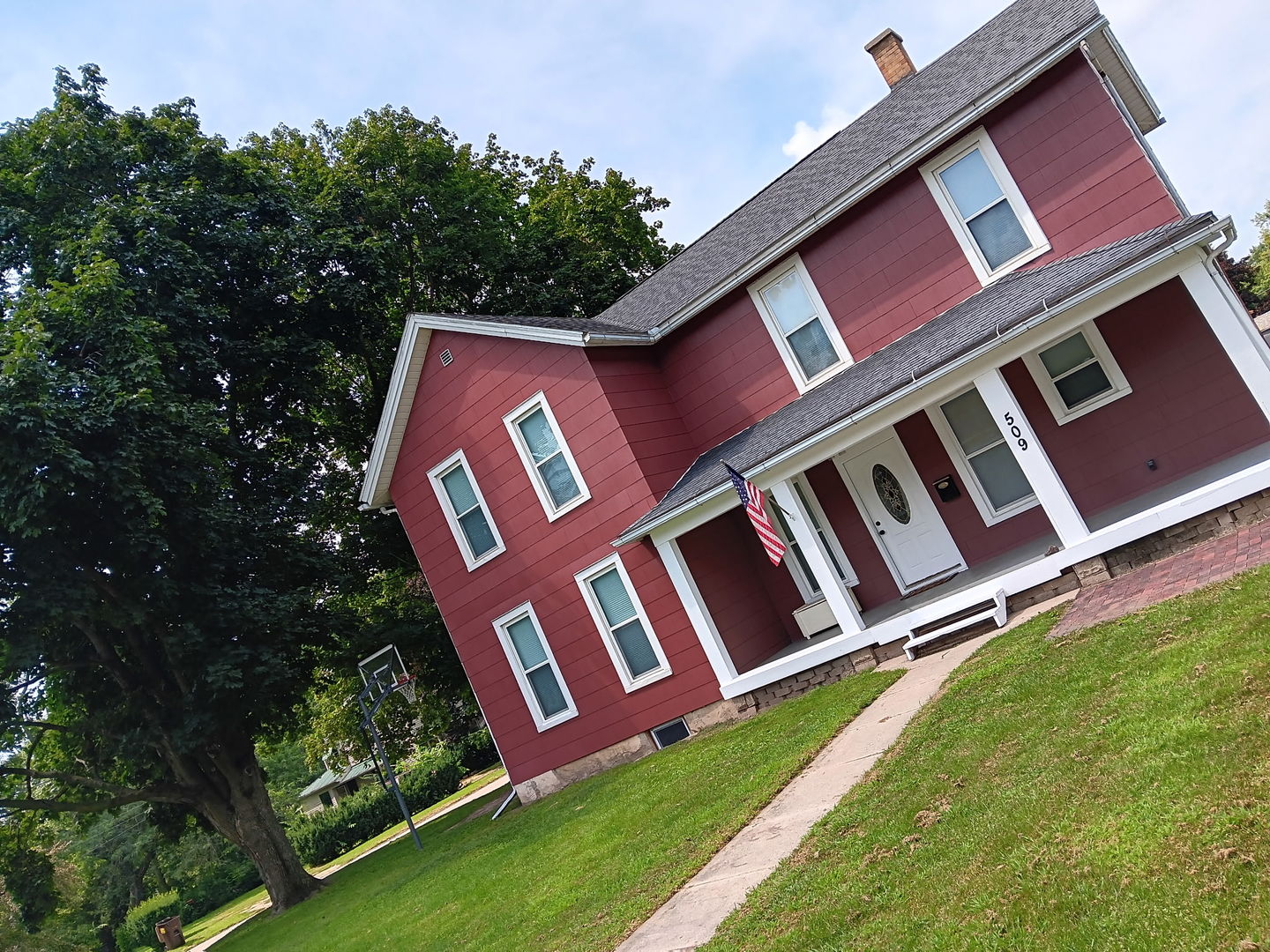 509 South Madison Street Morrison, IL 61270 - Photo 3 of 43 a sign that is on the side of a building