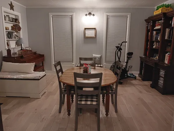 a kitchen with stainless steel appliances granite countertop a sink and a refrigerator