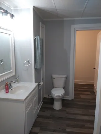 a view of a hallway with washer and dryer